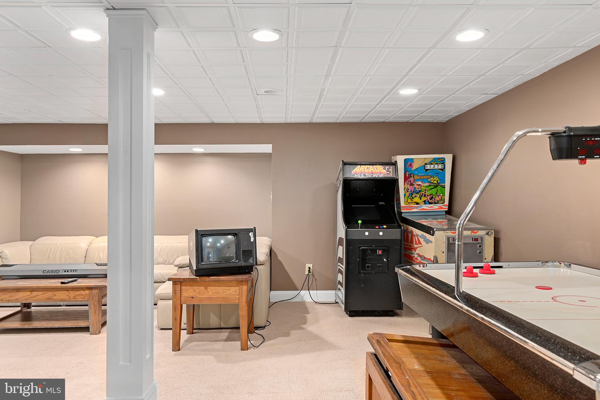 74 Lake Forest Drive Elkton, MD 21921 - Photo 59 of 65 a room with furniture and a flat screen tv