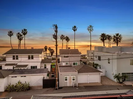 a view of a a dining room with furniture window and wooden floor