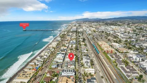 a bedroom with a bed and a mirror
