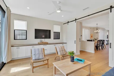 a bedroom with a bed and a table