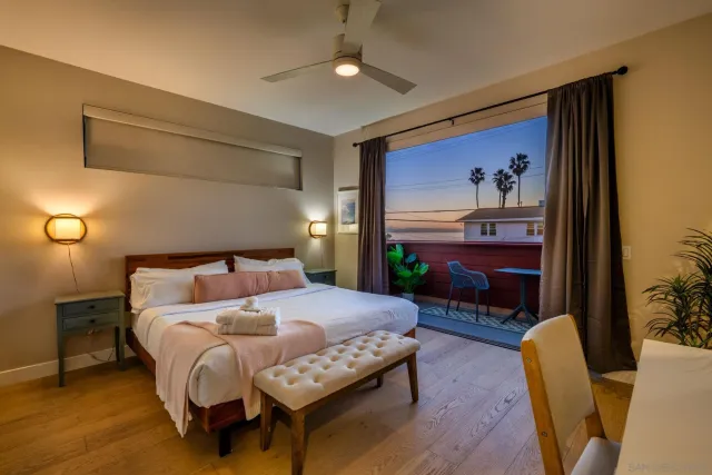 an aerial view of a city with ocean view