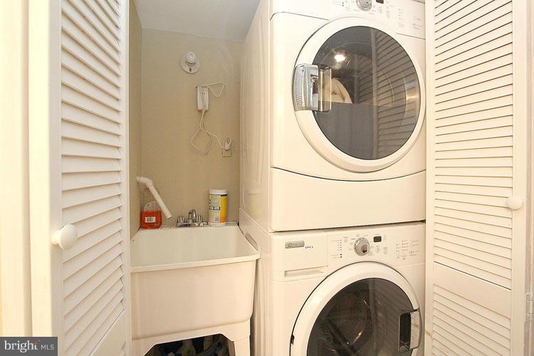 5329 Pooks Hill Road, Unit 405 Bethesda, MD 20814 - Photo 18 of 21 Laundry with full size stacking front loading w/d