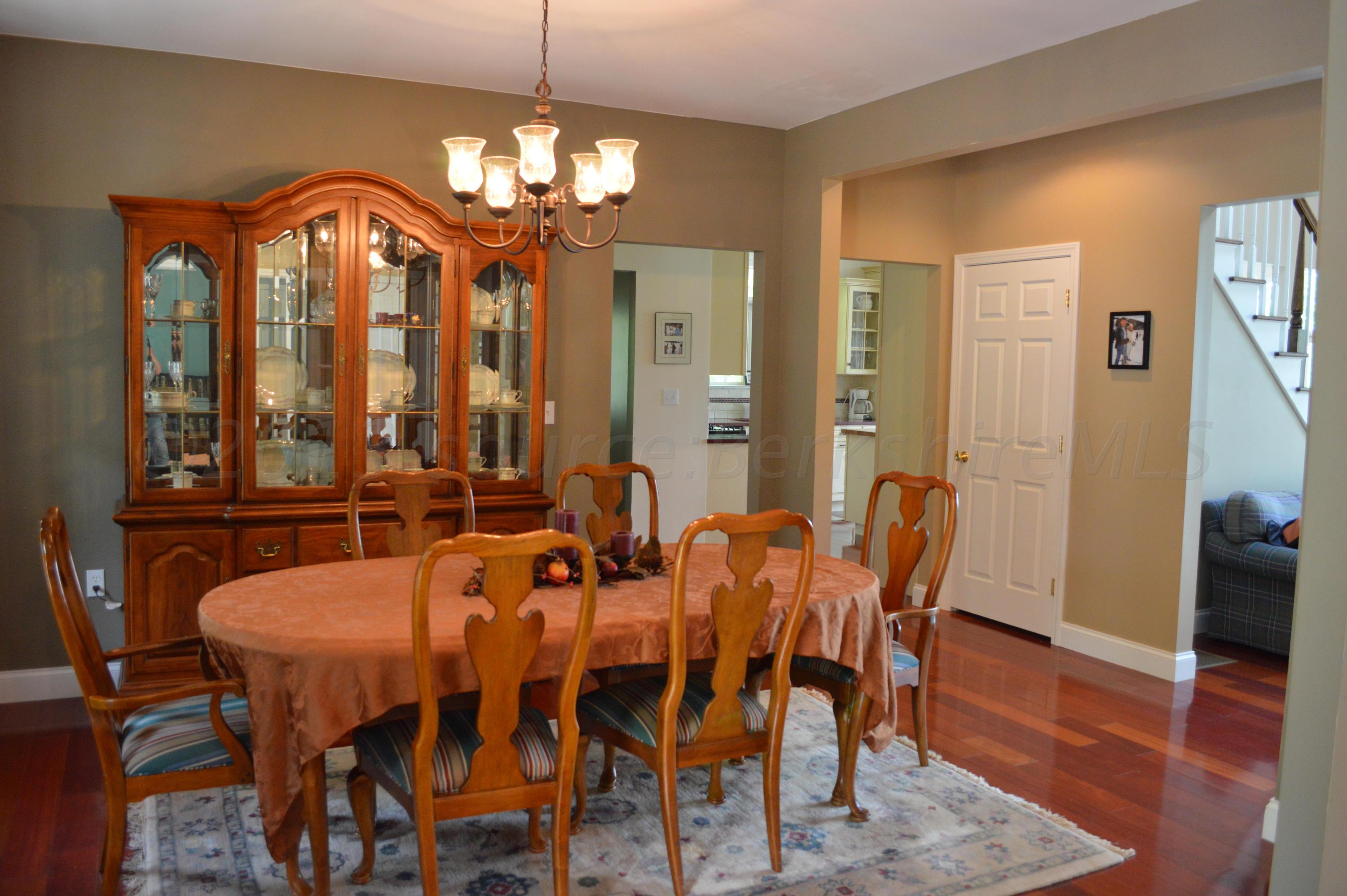 269 Skyline Ridge Road Becket, MA 01223 - Photo 22 of 42 a view of a dining room with furniture and wooden floor