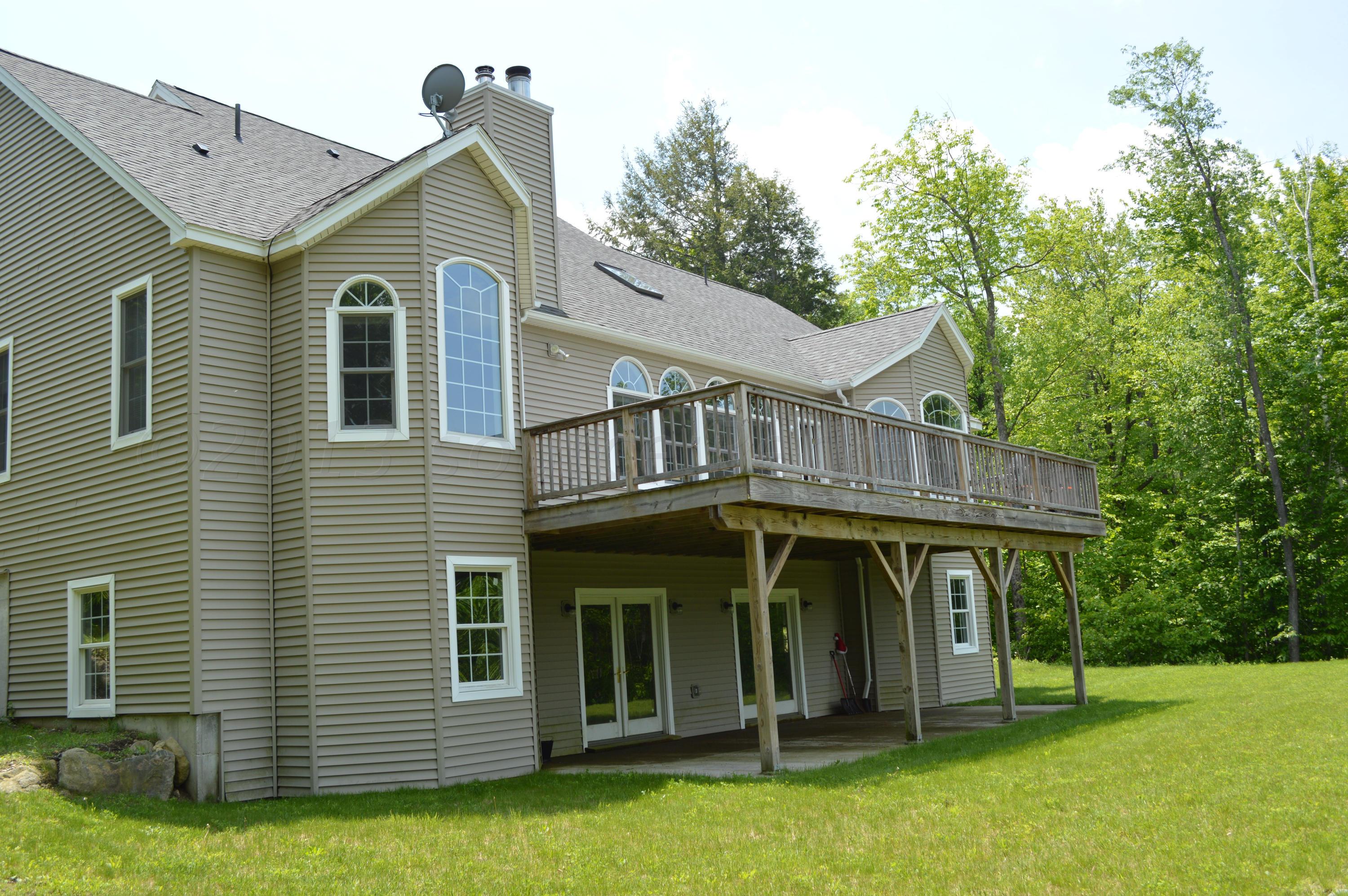 269 Skyline Ridge Road Becket, MA 01223 - Photo 36 of 42 a view of a house with garden
