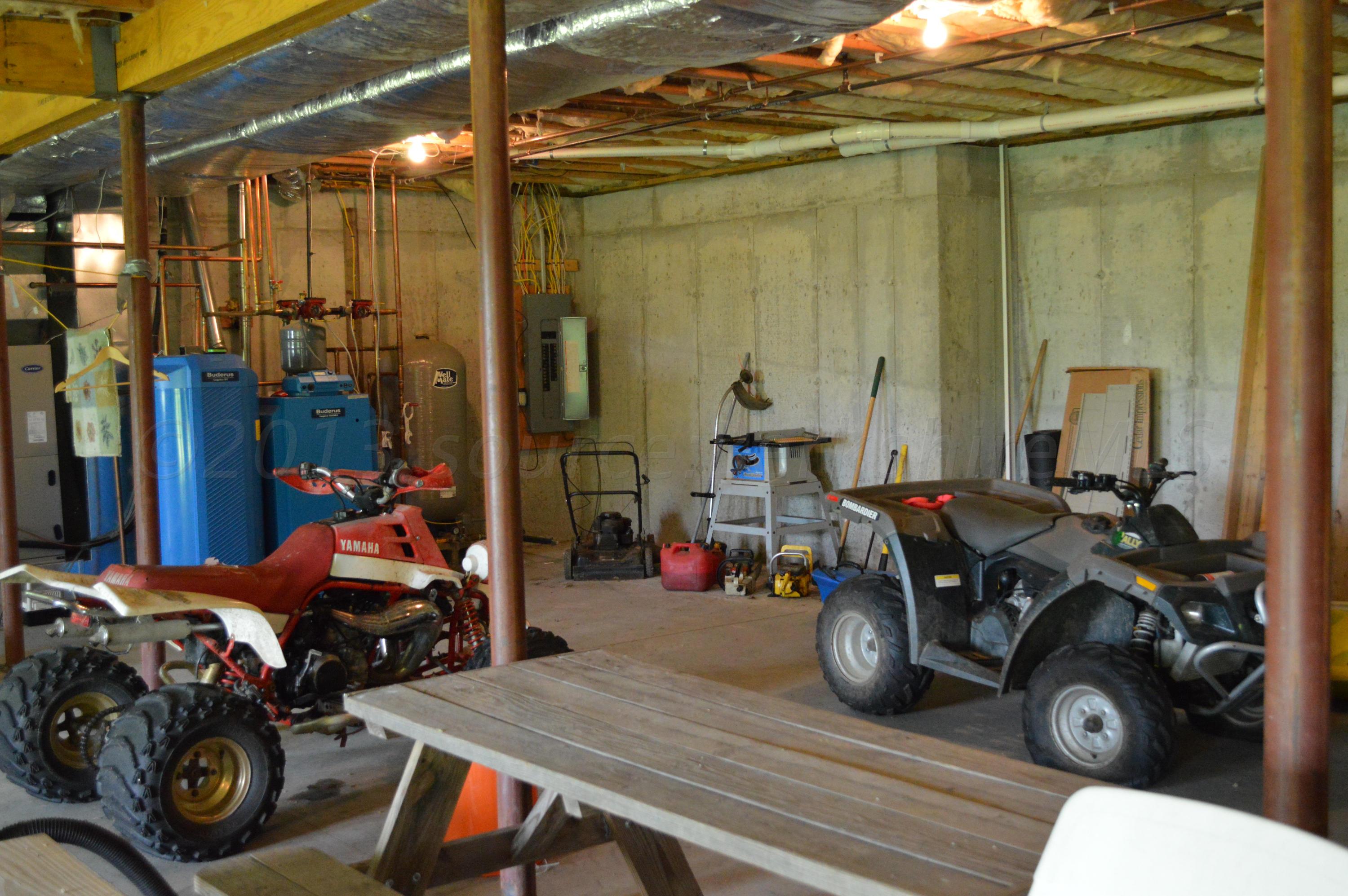 269 Skyline Ridge Road Becket, MA 01223 - Photo 40 of 42 a view of a room with gym equipment