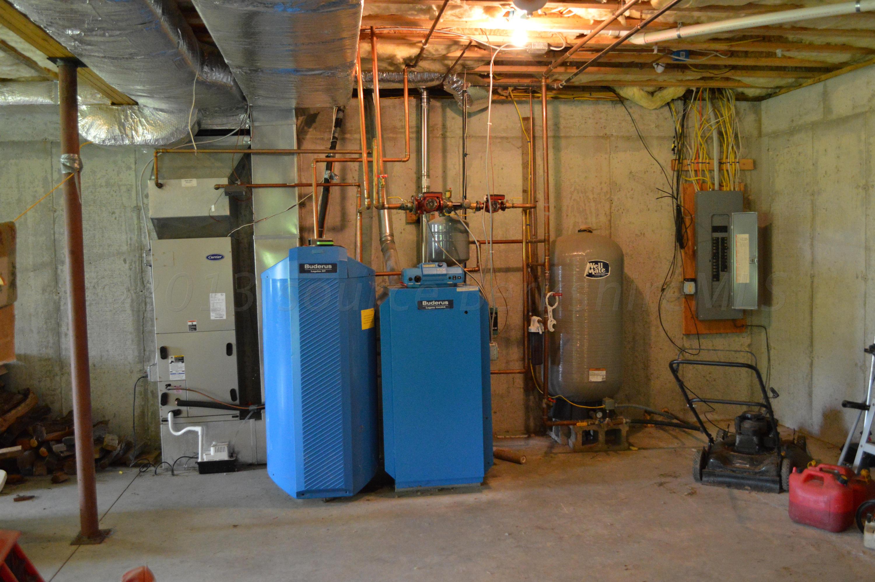 269 Skyline Ridge Road Becket, MA 01223 - Photo 41 of 42 a view of a room with gym equipment