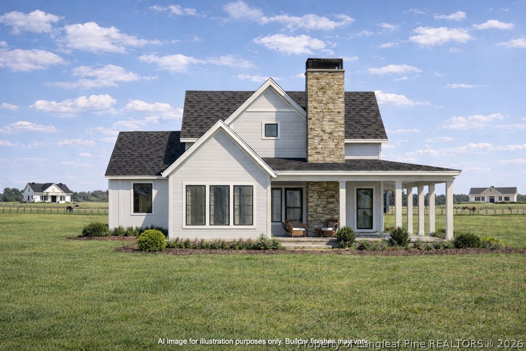 0 Paddock Meadows Red Springs, NC 28377 - Photo 2 of 29 a front view of house with yard barbeque and outdoor seating