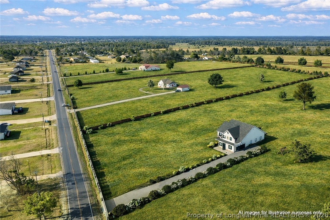 0 Paddock Meadows Red Springs, NC 28377 - Photo 24 of 29 an aerial view of a residential houses with outdoor space