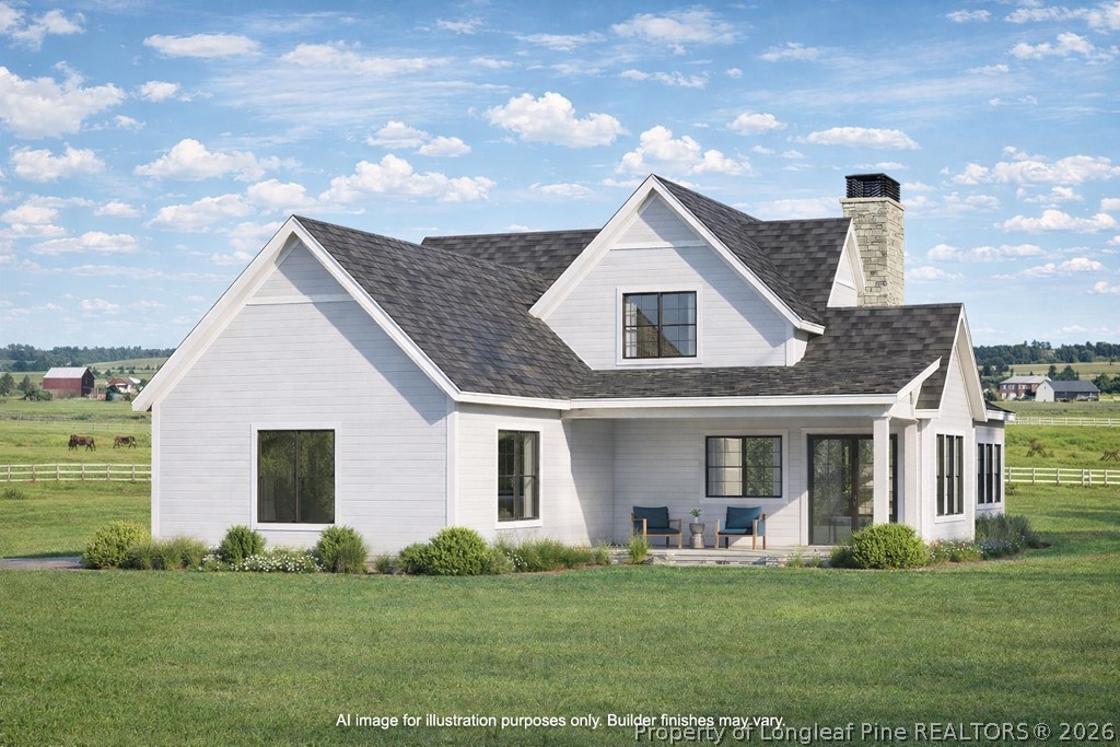 0 Paddock Meadows Red Springs, NC 28377 - Photo 3 of 29 a front view of a house with a garden