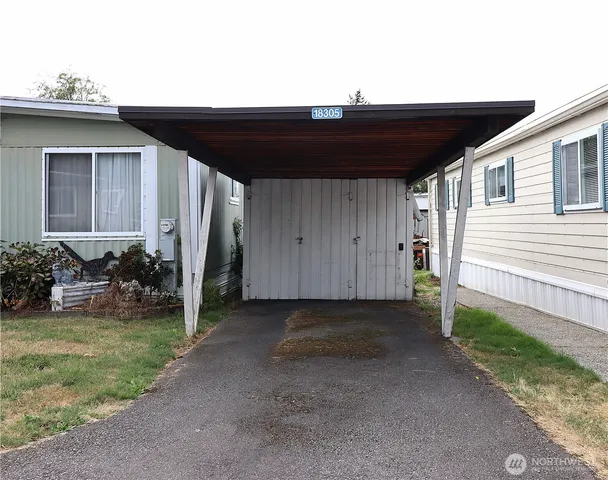 a view of a backyard of the house