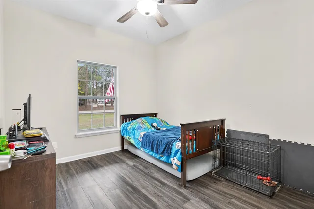 a room with a bed and a window