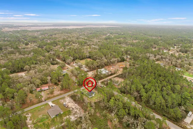 a view of a patio with a yard