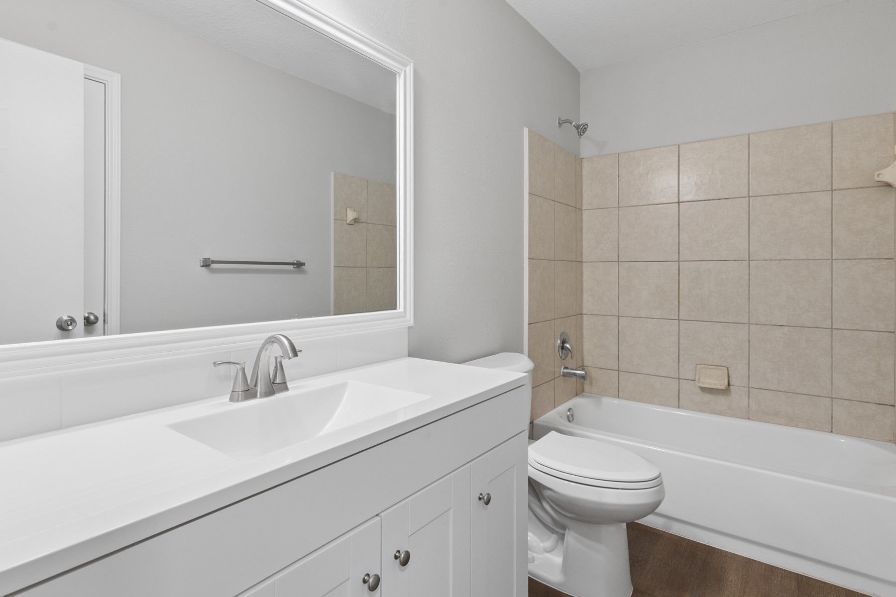 7811 Adonis Avenue Baytown, TX 77521 - Photo 30 of 36 a bathroom with a sink a toilet and shower