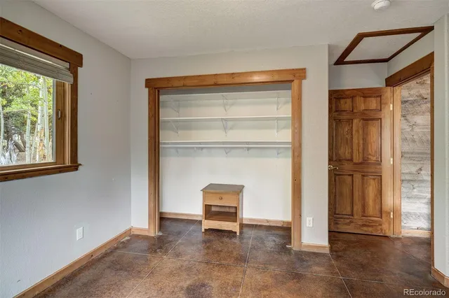 a view of a livingroom with a staircase