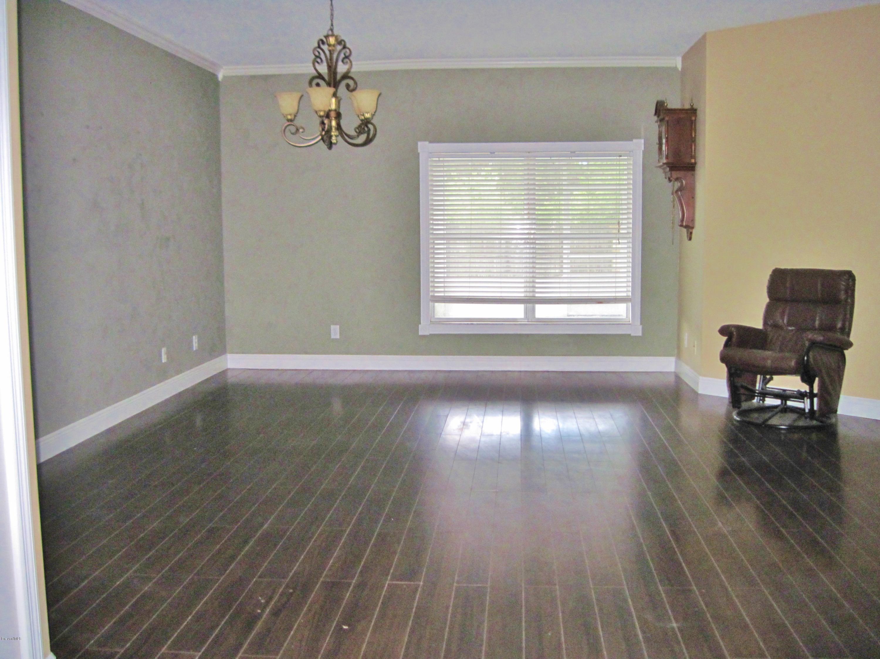 1104 Rabbit Street Southeast Palm Bay, FL 32909 - Photo 2 of 31 Living Room