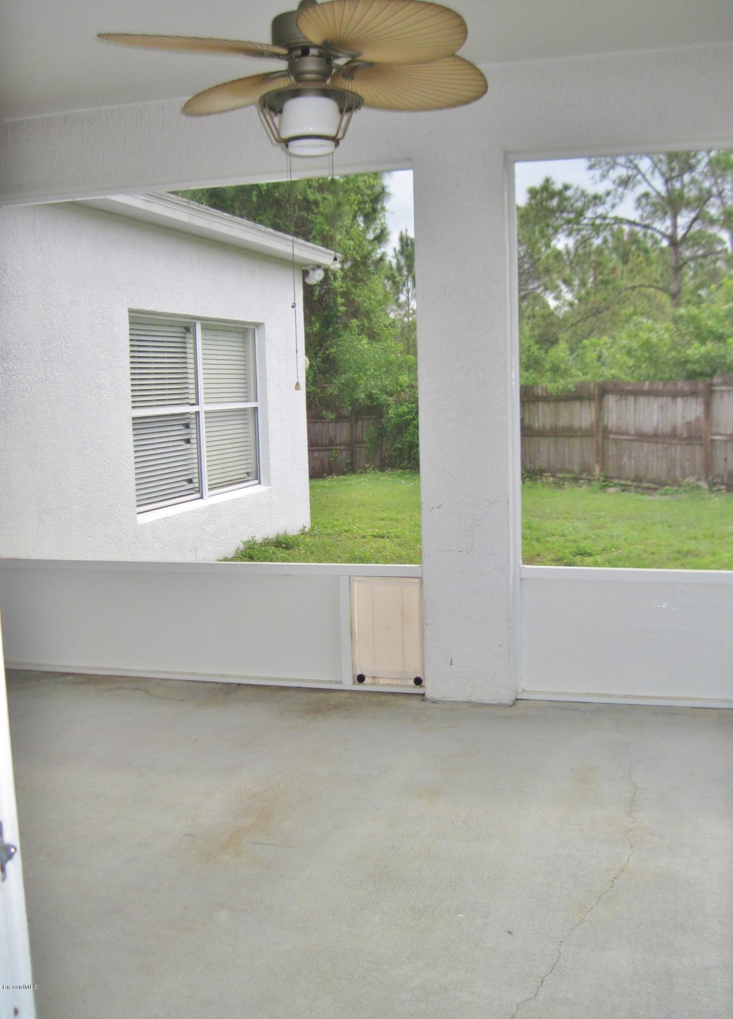 1104 Rabbit Street Southeast Palm Bay, FL 32909 - Photo 25 of 31 Back Patio