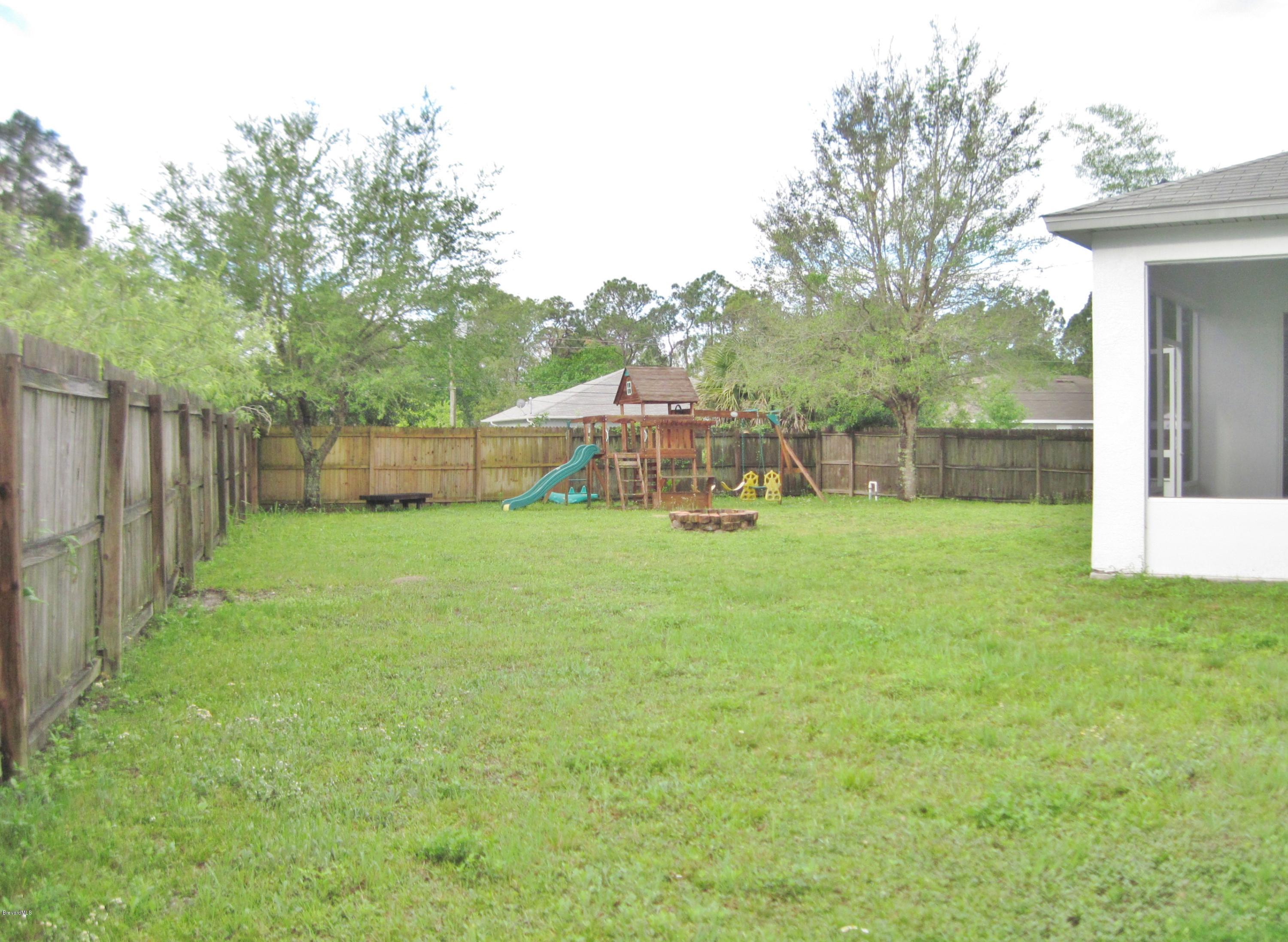 1104 Rabbit Street Southeast Palm Bay, FL 32909 - Photo 28 of 31 Lush Yard - Play Set