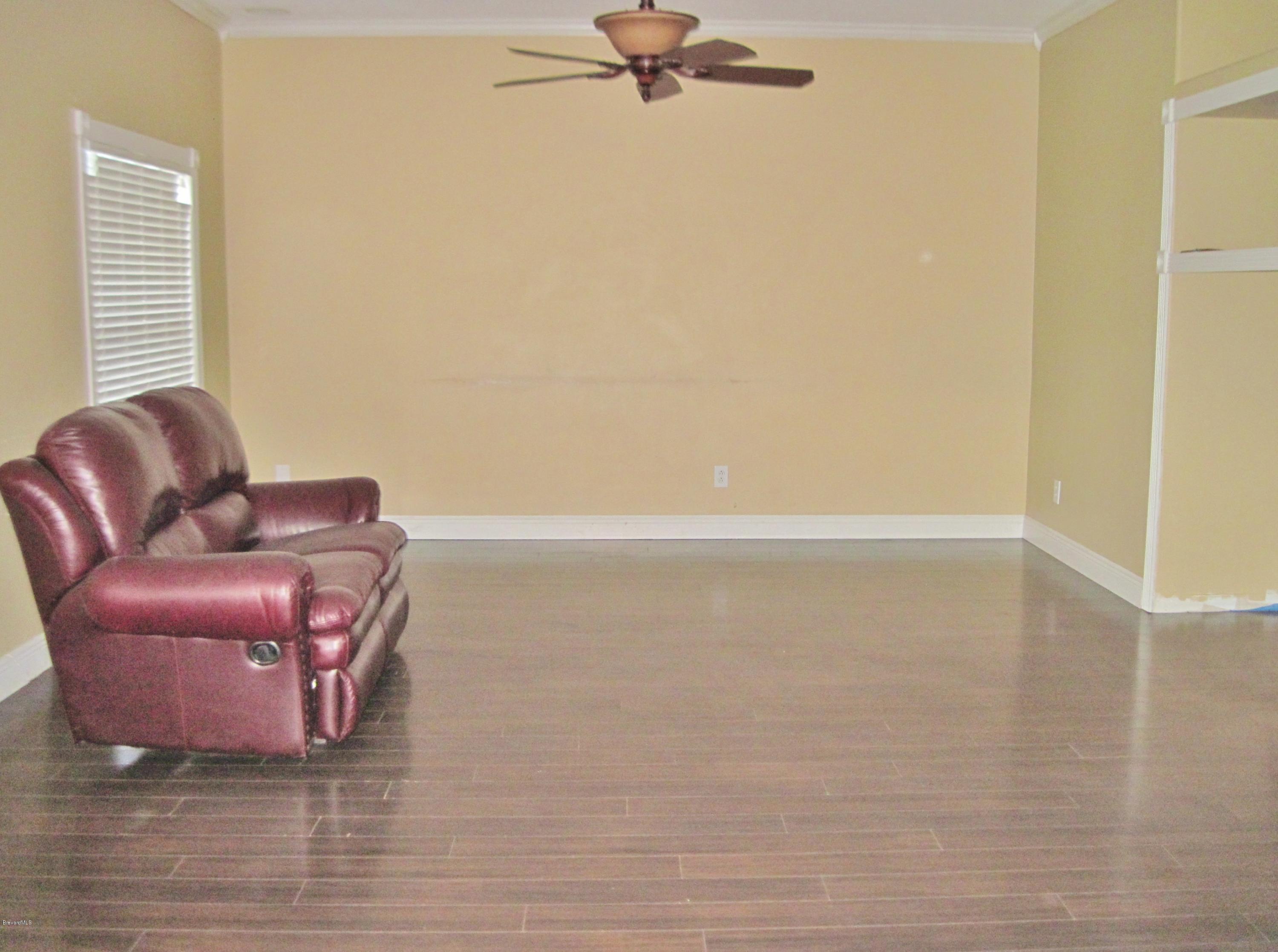1104 Rabbit Street Southeast Palm Bay, FL 32909 - Photo 8 of 31 Family Room