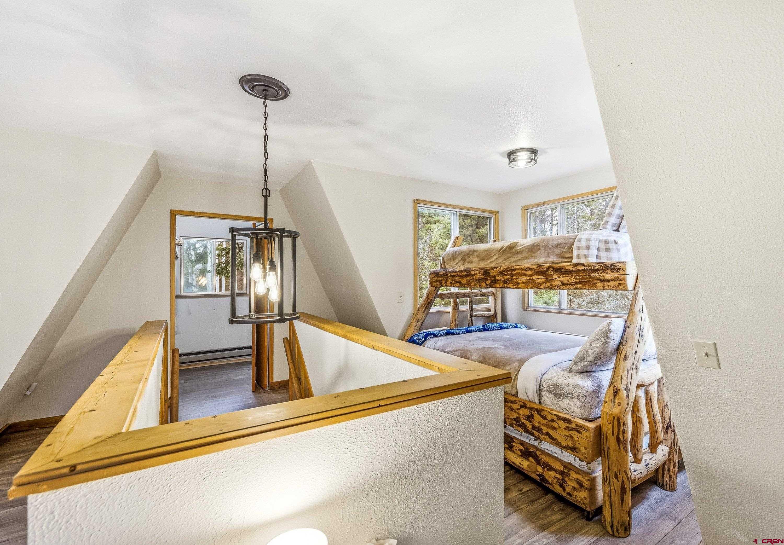 125 Aspen Trail Cimarron, CO 81220 - Photo 19 of 37 a view of a living room and chandelier