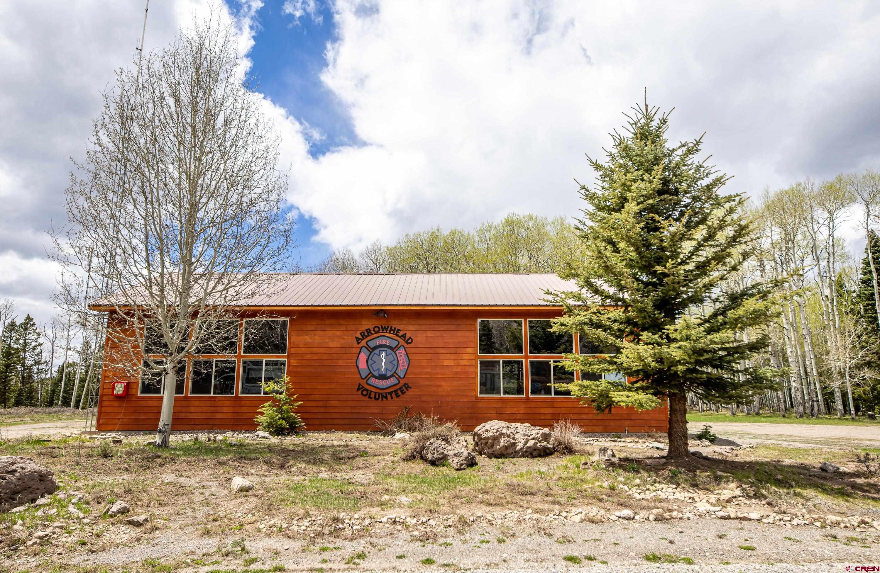 125 Aspen Trail Cimarron, CO 81220 - Photo 24 of 37 a view of a house with a yard