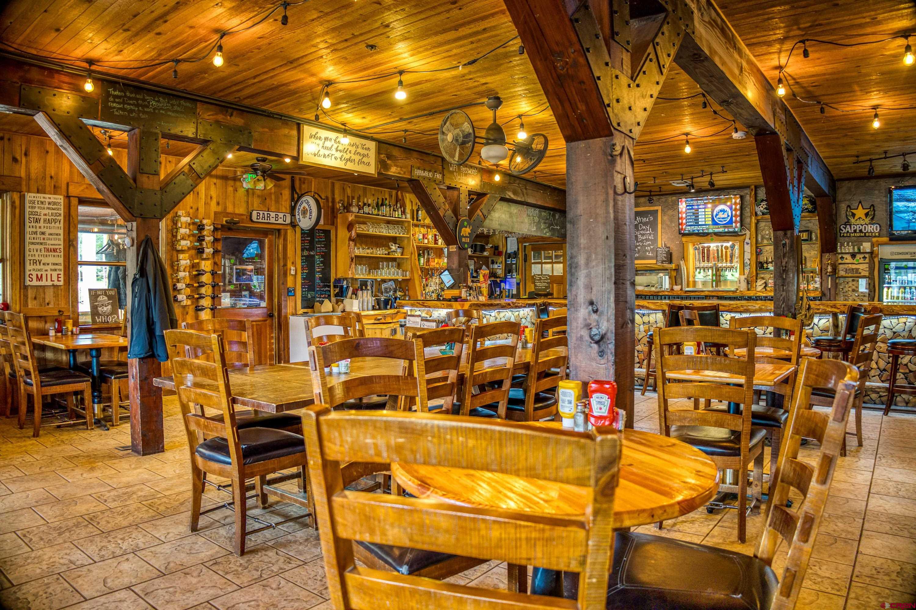 125 Aspen Trail Cimarron, CO 81220 - Photo 28 of 37 a view of a chairs and table in a patio