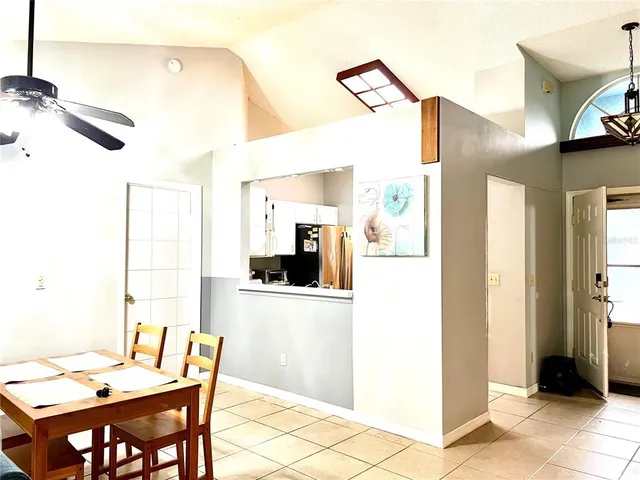 a view of a dining room with furniture