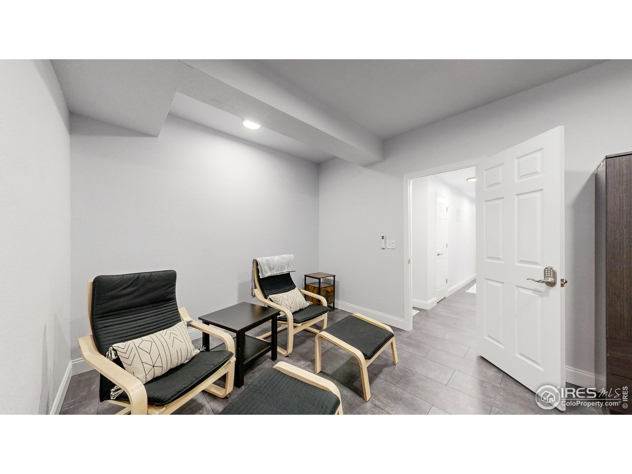 10527 Troy Street Commerce City, CO 80022 - Photo 24 of 35 Downstairs bedroom #6 as a TV Room or make into a rec room.