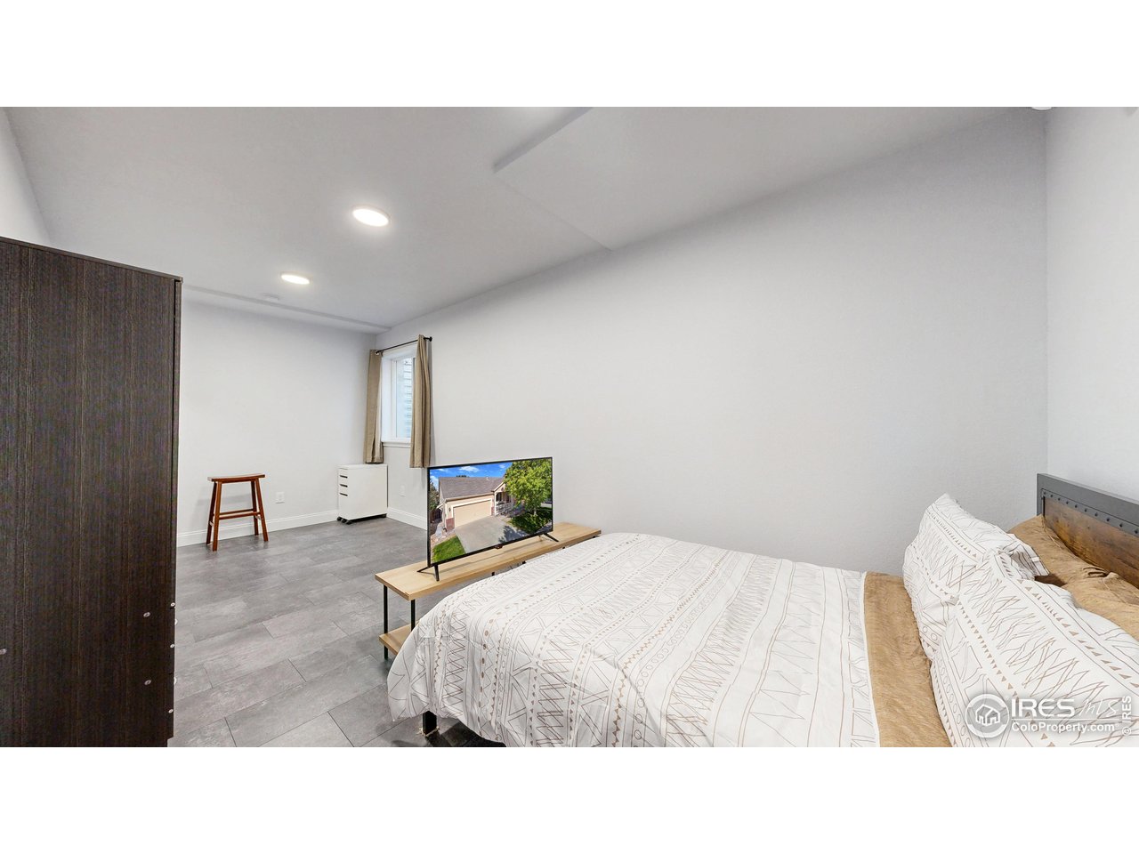 10527 Troy Street Commerce City, CO 80022 - Photo 25 of 35 Downstairs bedroom #5 with egress