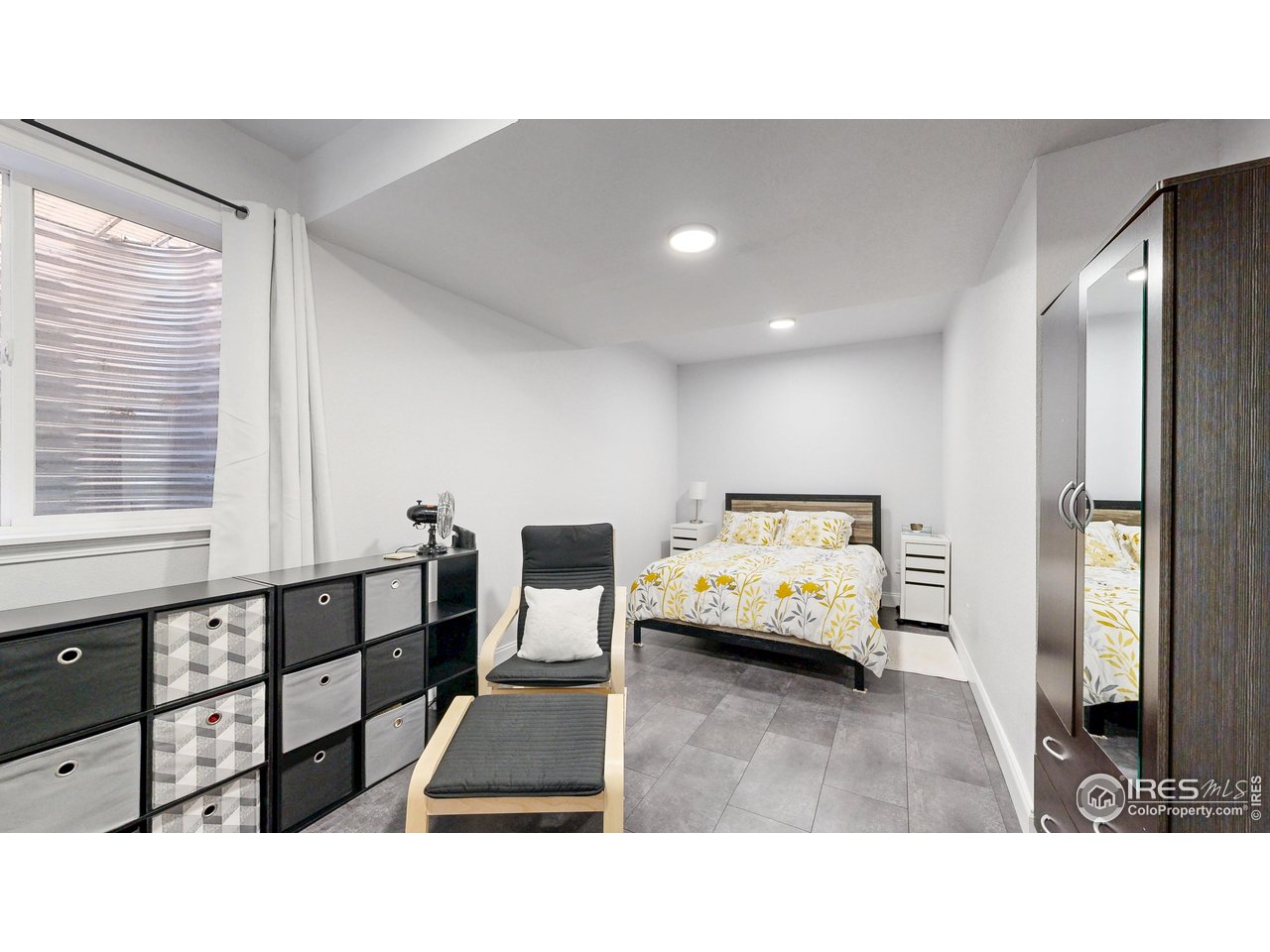 10527 Troy Street Commerce City, CO 80022 - Photo 27 of 35 Downstairs bedroom #6 with egress