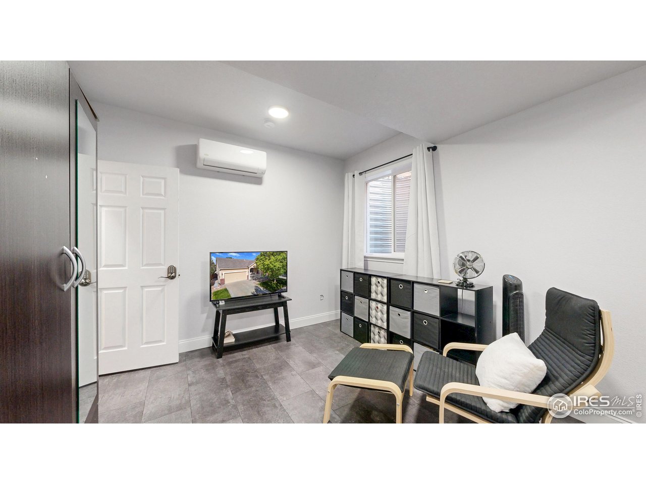 10527 Troy Street Commerce City, CO 80022 - Photo 28 of 35 Downstairs bedroom #6 with egress