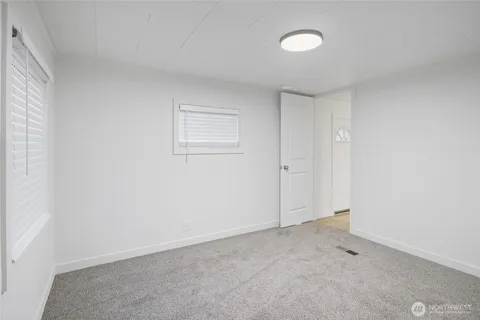 an empty room with a workbench