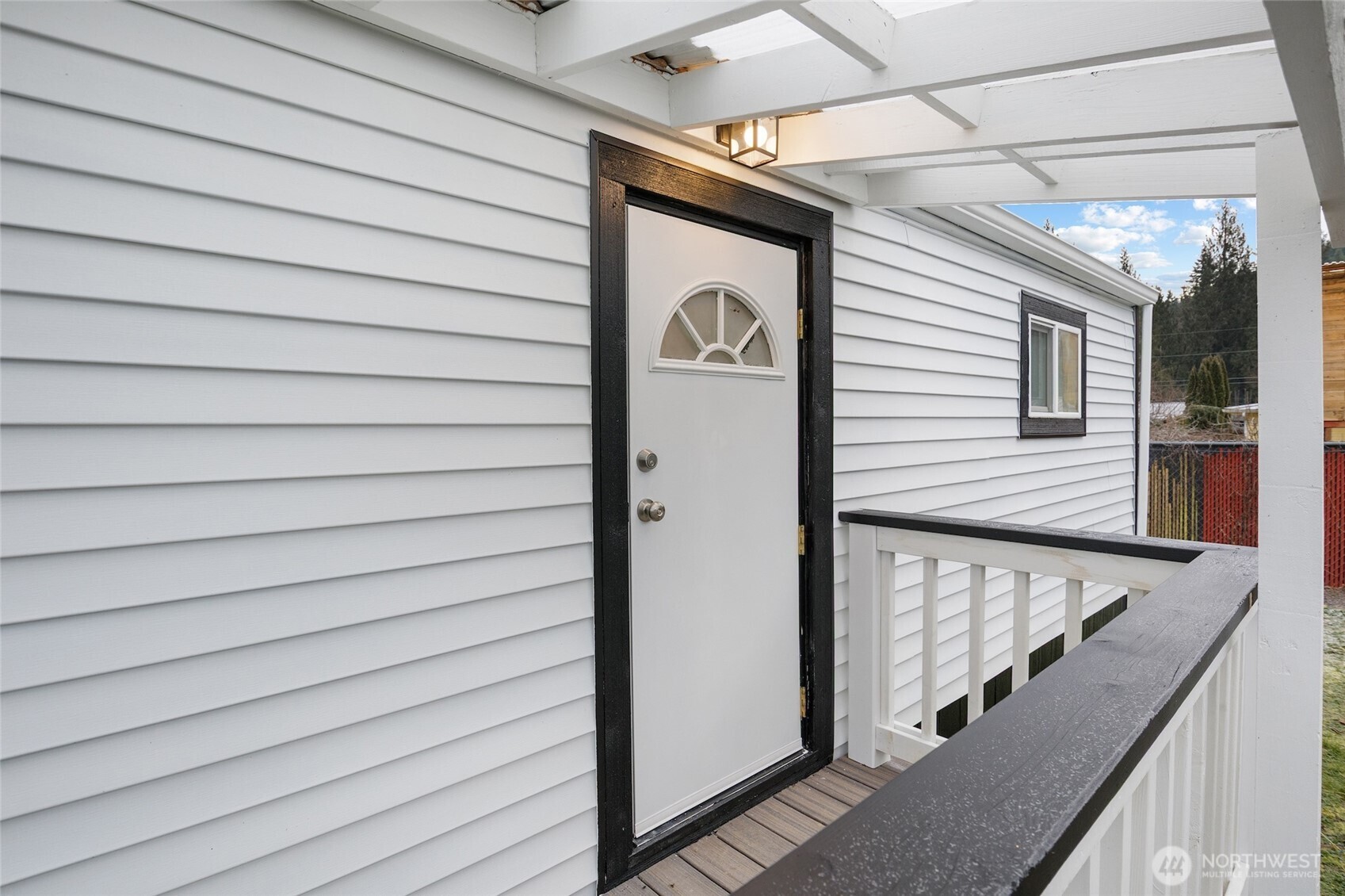 32501 Northeast 50th Street, Unit 37 Carnation, WA 98014 - Photo 16 of 20 a view of a house with wooden deck