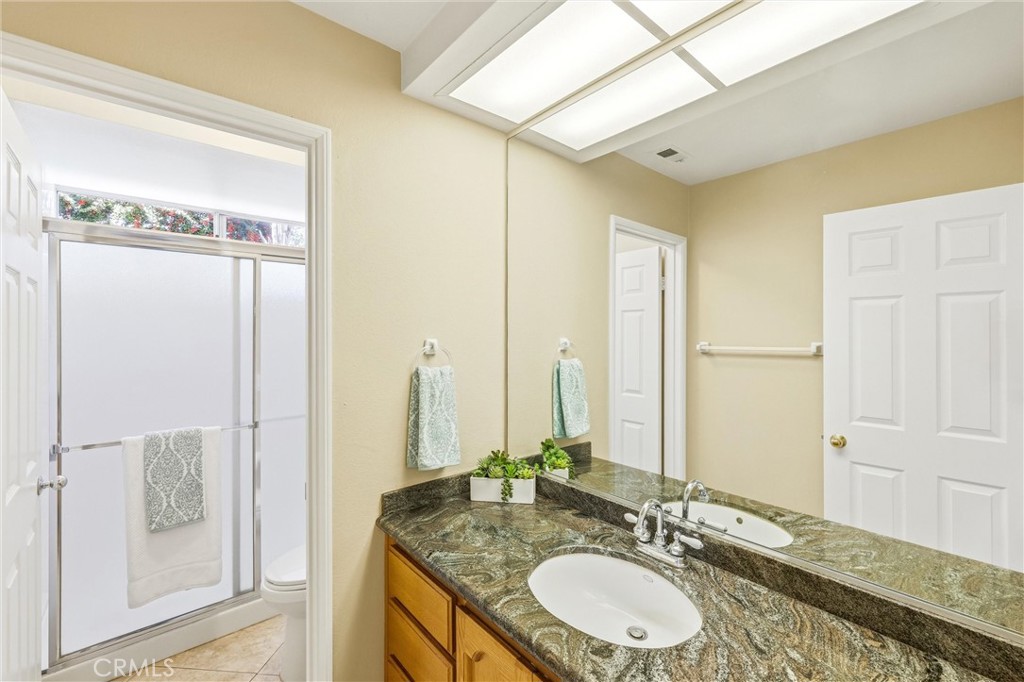 2000 Citrus Wood Lane Riverside, CA 92503 - Photo 13 of 23 Downstairs bathroom with shower