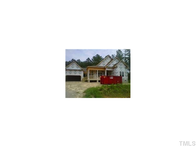 1421 Silver Farm Road Raleigh, NC 27603 - Photo 1 of 1 a view of a yard in front of a house