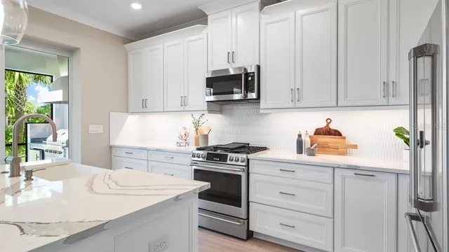 a bedroom with a bed and a night stand