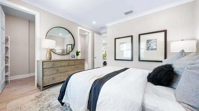 a view of a garden with a building in the background