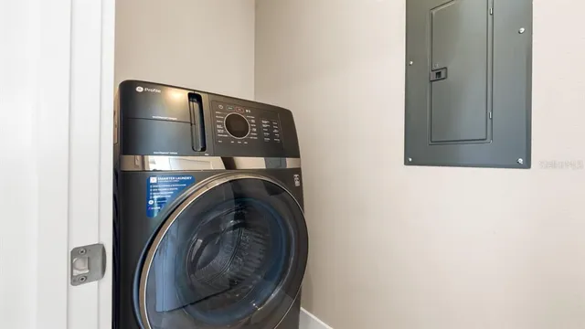 a view of a house with a yard and a garden