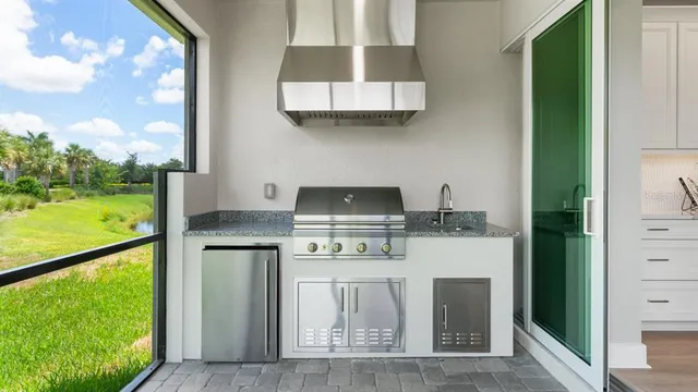 a backyard of a house with outdoor seating