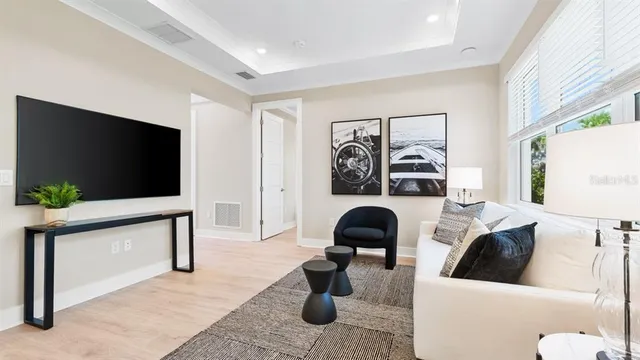 a living room with furniture and a table