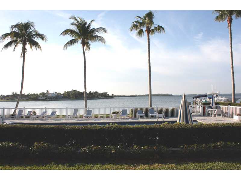 1901 Bay Road, Unit 203 Vero Beach, FL 32963 - Photo 22 of 22 a view of ocean with boats and palm trees