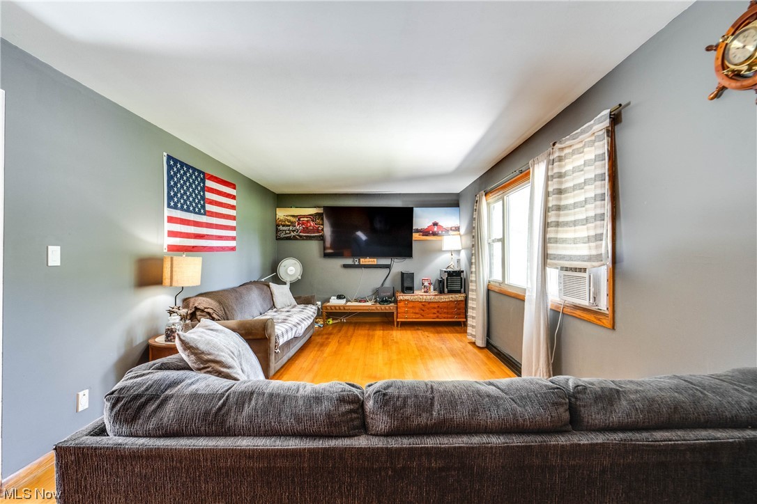 7384 Clark Road Atwater, OH 44201 - Photo 6 of 26 Living room with hardwood flooring