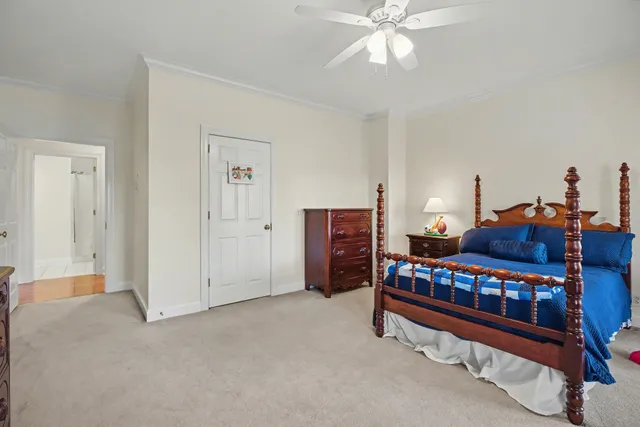 a spacious bathroom with a double vanity sink a mirror and a