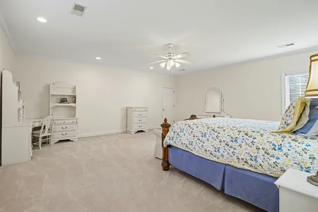 a view of a livingroom with furniture and a table