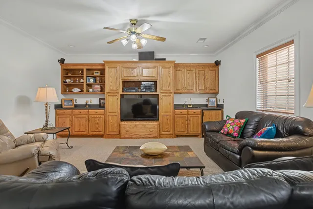 a en suite bathroom with a sink a mirror and a shower