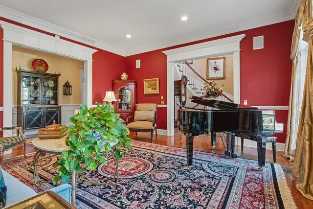 a living room with stainless steel appliances kitchen island granite countertop furniture and a kitchen view