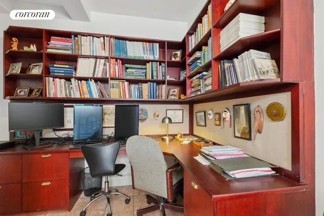 a view of a workspace with furniture