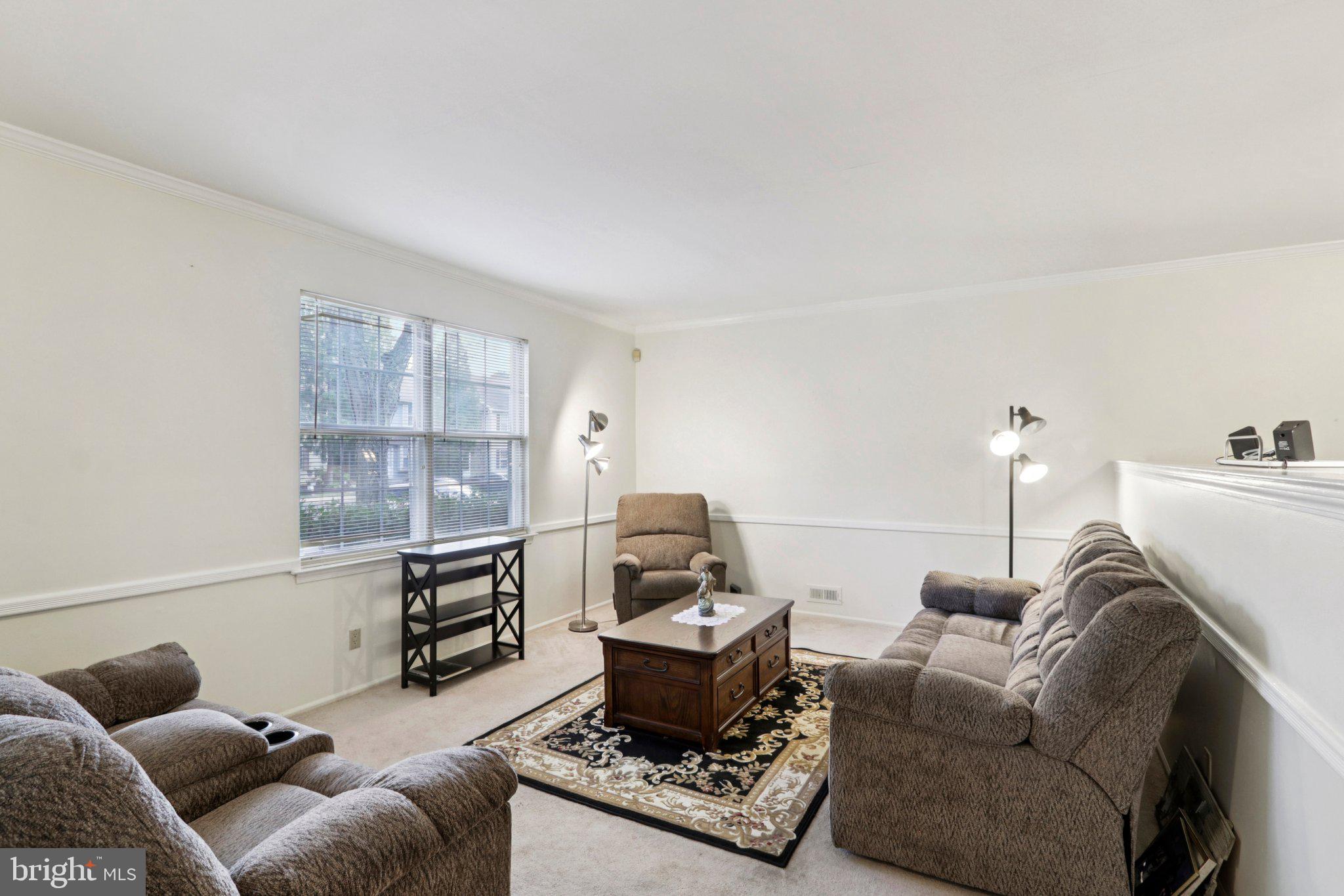 329 Gwynedd Court Mount Laurel, NJ 08054 - Photo 14 of 52 a living room with furniture and a window