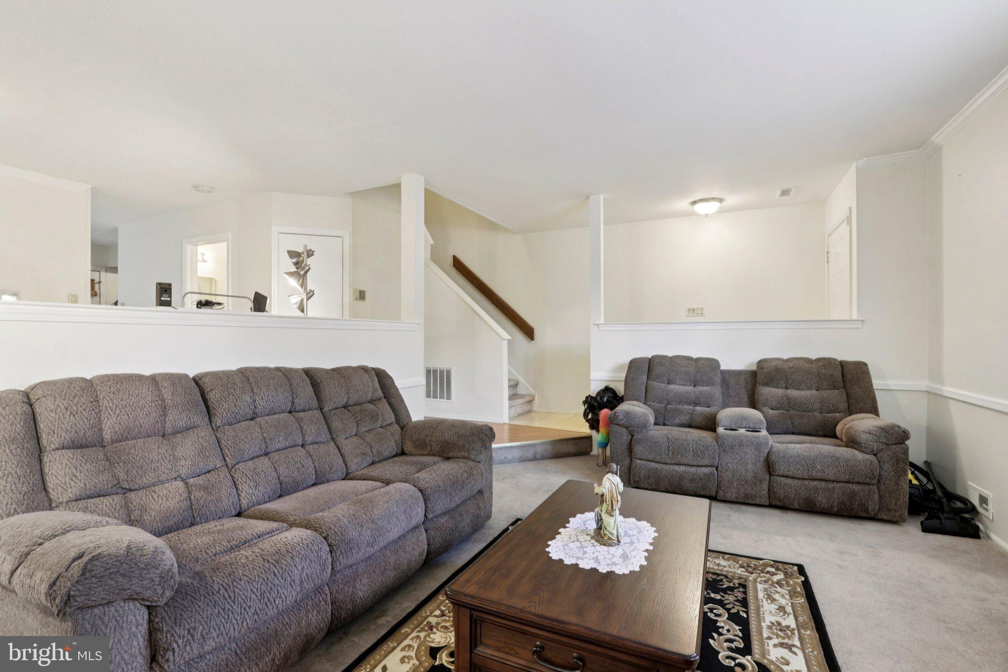 329 Gwynedd Court Mount Laurel, NJ 08054 - Photo 15 of 52 a living room with furniture and a couch