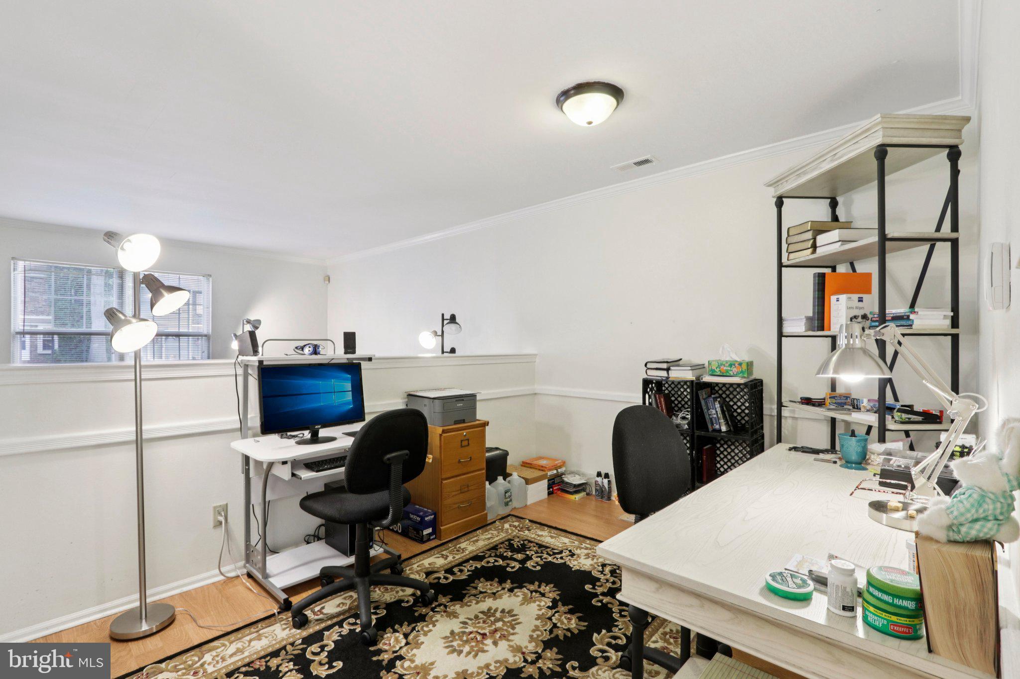 329 Gwynedd Court Mount Laurel, NJ 08054 - Photo 16 of 52 a work room with furniture a rug and white walls