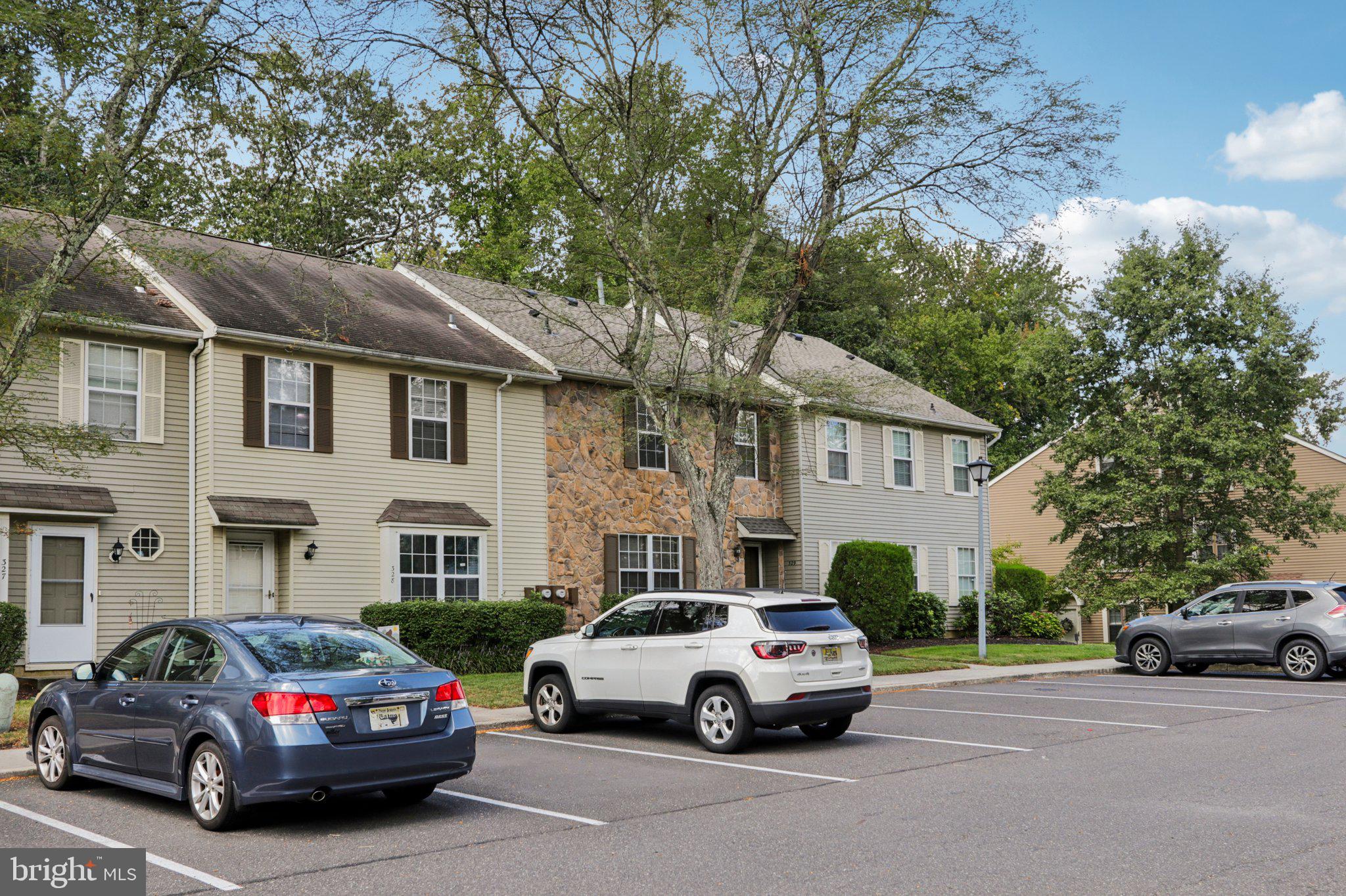 329 Gwynedd Court Mount Laurel, NJ 08054 - Photo 2 of 52 a car parked in front of a house